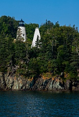 Eagle Island Light and Fog Tower Among Evergreens